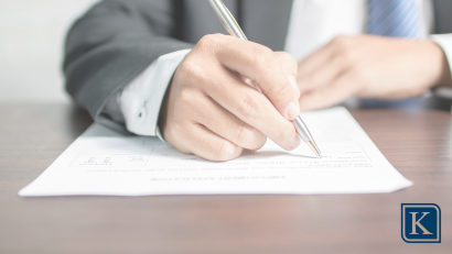 hands-writing-on-document